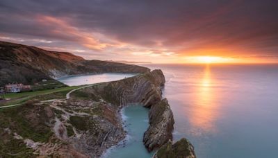 UK's 'most picturesque coastal walk' takes you past natural arch and fossil beaches