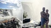 ‘Daredevil’ tourist dangles over edge of 1,640-foot waterfall in ‘risky’ stunt caught on shocking video