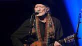 SOS: Front-row seats didn't provide much of a view of seated Willie Nelson