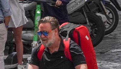 Russell Crowe and gf Britney Theriot go for a scooter ride in Rome