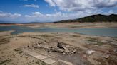 Parched Philippine dam reveals centuries-old town, luring tourists