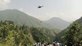 Eight people trapped in cable car dangling 900ft over Pakistan ravine saved in dramatic rescue