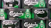 Carlsberg buys huge UK soft drink firm for £3.3BILLION as Brits shun booze