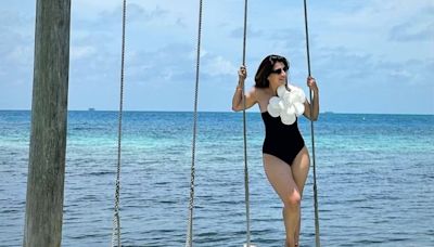 In Pics: Actress Mehreen Pirzada Stuns In Black Monokini On Beach Vacation In Belize - News18