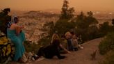 Martian skies over Athens? Greece's capital turns an orange hue with dust clouds from North Africa