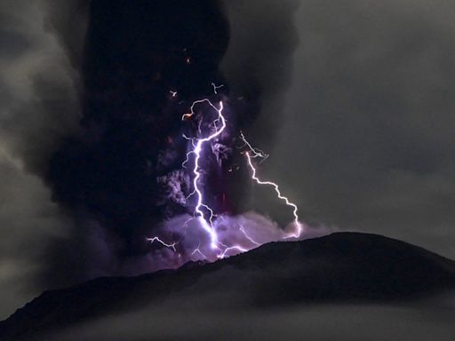 Indonesia’s Mount Ibu volcano eruption shoots grey ash clouds into sky