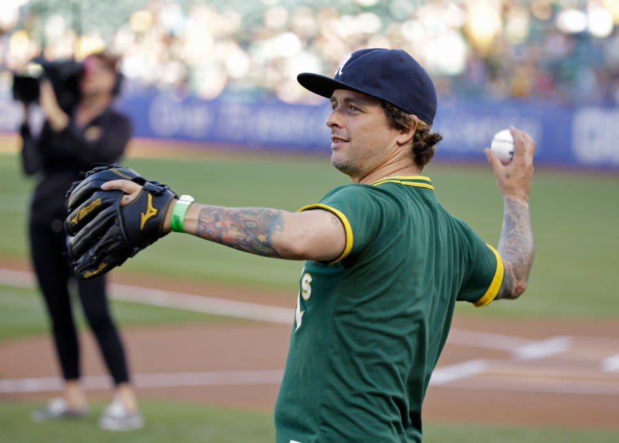 Green Day’s Billie Joe Armstrong spray-paints over A’s logo at Toronto Blue Jays’ stadium