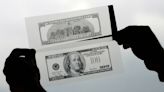 Pair turned $1 bills into fake $100 bills with help of bleach and a printer, feds say