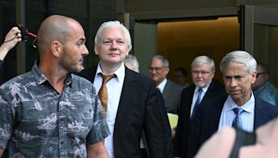 Julian Assange walks free after making deal with US to plead guilty in remote Pacific island court