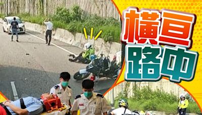 屯門公路警察電單車跣胎翻側 交通警員倒地受傷