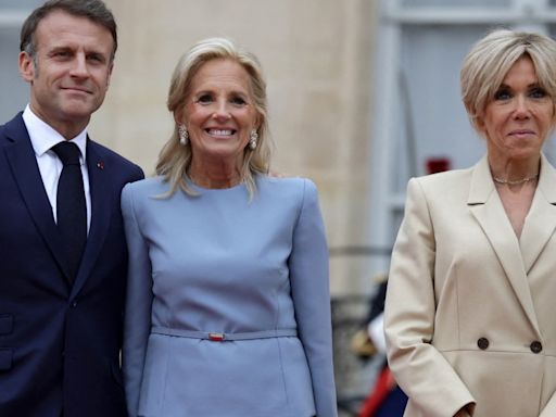 Jill Biden Continues Her Blue Style Streak and France’s First Lady Brigitte Macron Favors Louis Vuitton Coat Dress...
