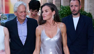 Queen Letizia Channels ’90s Kate Moss In a Plunging Silver Slip Dress