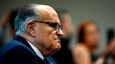 Rudy Giuliani says the supermarket employee accused of slapping him should be prosecuted