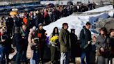 Hundreds queue in Moscow to visit grave of Putin critic Navalny