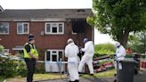 Two women killed in house fire as police arrest two men on suspicion of murder