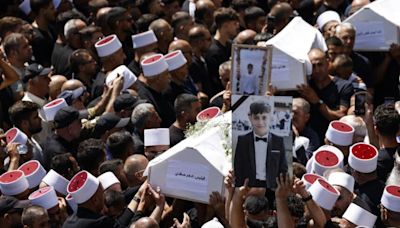Thousands of Druze mourn youths killed in Golan rocket attack