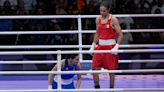 Italian boxer abandons bout against Algerian disqualified from previous competition for elevated testosterone | CBC Sports