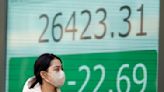 Asian shares mixed ahead of key US inflation data
