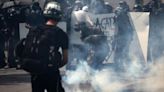 French police clash with water demonstrators after port blockade