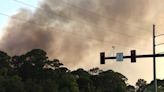 Brush fire sent thick, black smoke billowing across Palm Beach Gardens and Jupiter