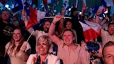 Far-right National Rally leads first round of voting in French election, exit polls show