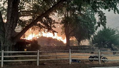 Wildfires prompt California evacuations as crews battle Oregon and Idaho fires stoked by lightning