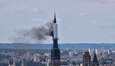 French firefighters stop blaze in spire of medieval Rouen Cathedral