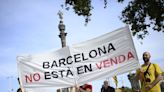 Protesters spray water guns at tourists in Barcelona as thousands rally against overtourism