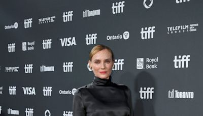 Diane Kruger Exudes Sophistication in a Netted Veil and transparent Lace Skirt