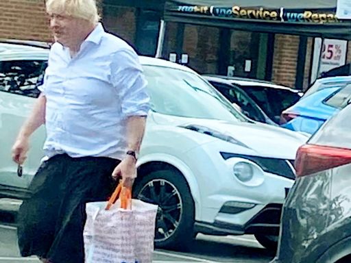 Boris Johnson looks relaxed while shopping at budget chain B&M in Oxfordshire