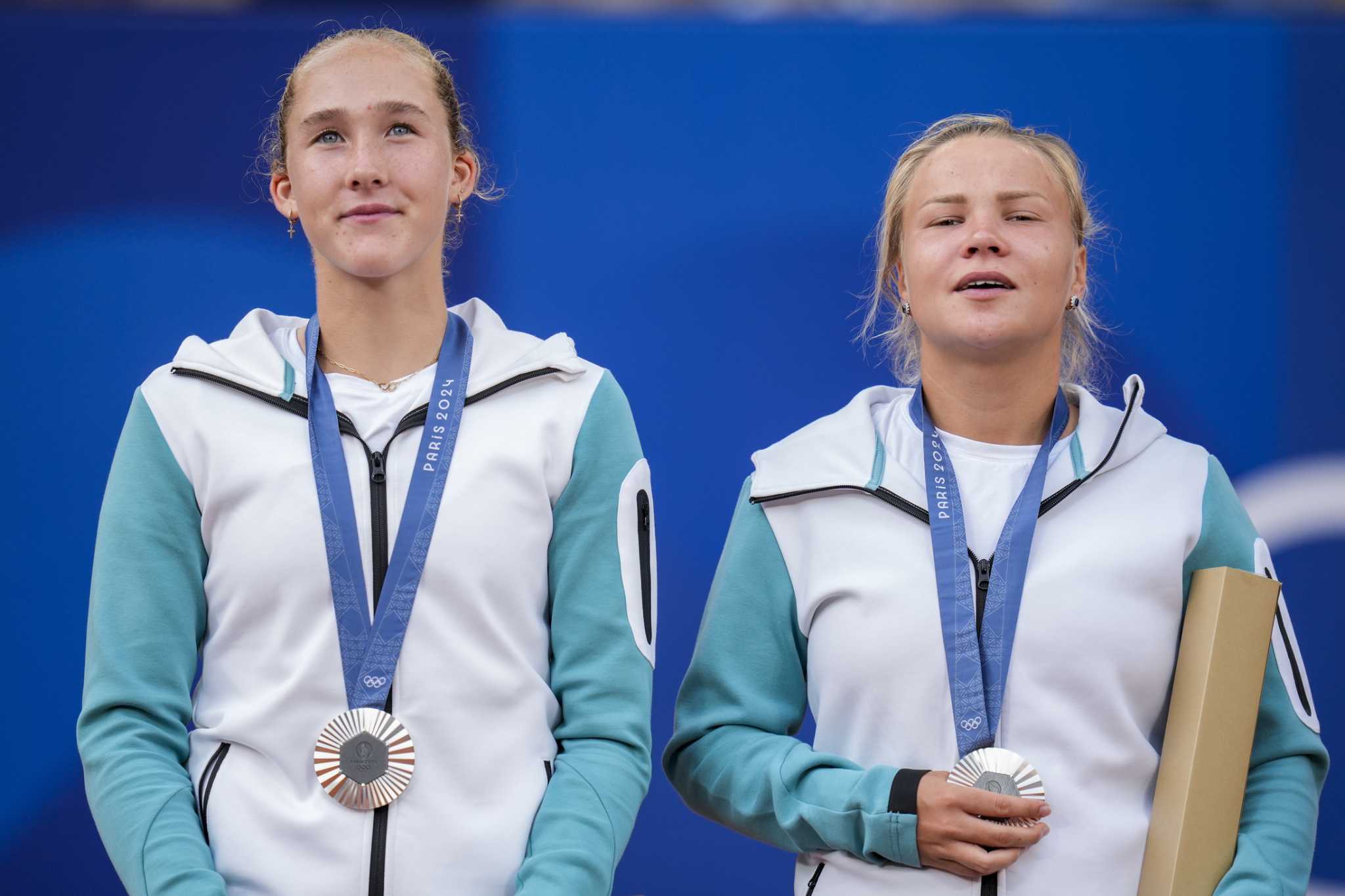 Andreeva and Shnaider, part of AIN, are the first Russians to get a medal at the 2024 Olympics