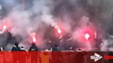 Friendly game abandoned after 'youths' set off flares as police called