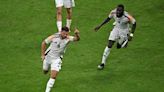 Last-gasp Niclas Fuellkrug goal rescues top spot for Euro hosts Germany
