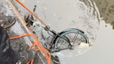 Magnet "Fisherman" Hook Abandoned Bikes In Amsterdam's Waterways