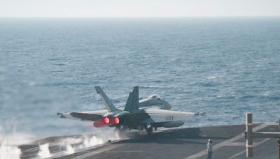 A US Navy carrier strike group locked in a Red Sea battle has fired over 500 munitions fighting the Houthis