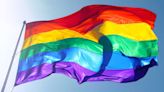 Troy hosts Pride Flag raising ceremony