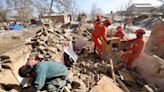 Chinese earthquake victims pulled to safety in sub-zero cold