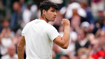 Carlos Alcaraz overcomes slow start to sail into Wimbledon third round