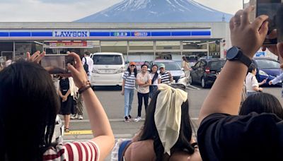 Japan town blocks view of Mt Fuji at photo spot to stop crowds