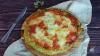 “Facile et gourmande” : notée 5/5 par les lecteurs de 750g, cette recette de pizza de courgettes sans pâte va vous régaler !