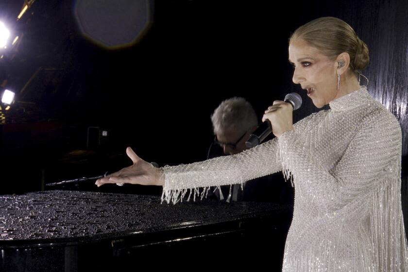 How Céline Dion reacted to her triumphant Eiffel Tower performance at Paris Olympics