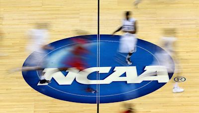 NCAA votes to approve payments to student athletes