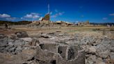 A 300-year-old settlement resurfaces as severe drought dries up a dam in the Philippines