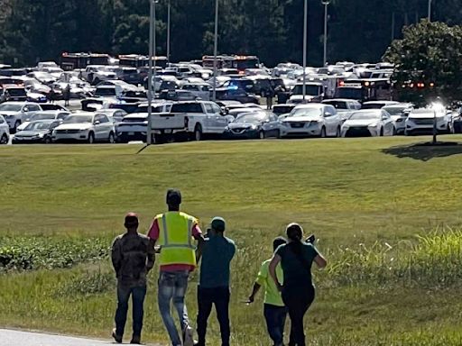 Shooting at Georgia high school leads to unknown number of injuries as students flee to stadium