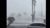 Watch A Typhoon Push A Car Backwards As It Drives Into The Wind