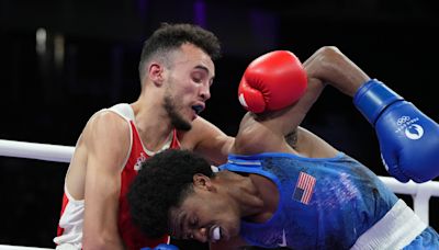 Boxing-Cuba's Lopez Cardona begins quest for third gold, Australia, India struggle