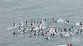 A memorial paddle out for Callum Robinson, one of the three surfers killed in Mexico.