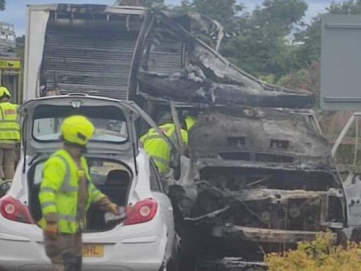 Van bursts into flames after crash with car near Dundee