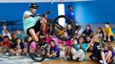 'Best day ever!' Nonprofit surprises kids with new bikes at Lakeland Boys and Girls Club