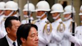 Taiwan president says only military strength can keep the peace with China